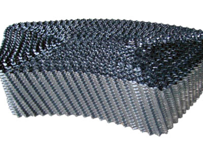 There is one mass of black cooling tower fill with irregular trapezoidal shape.