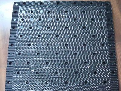 This piece of cooling tower fill is square, and it has large mount of raising points.