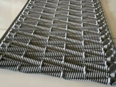 There is one piece of gray cooling tower fill just made in the warehouse.