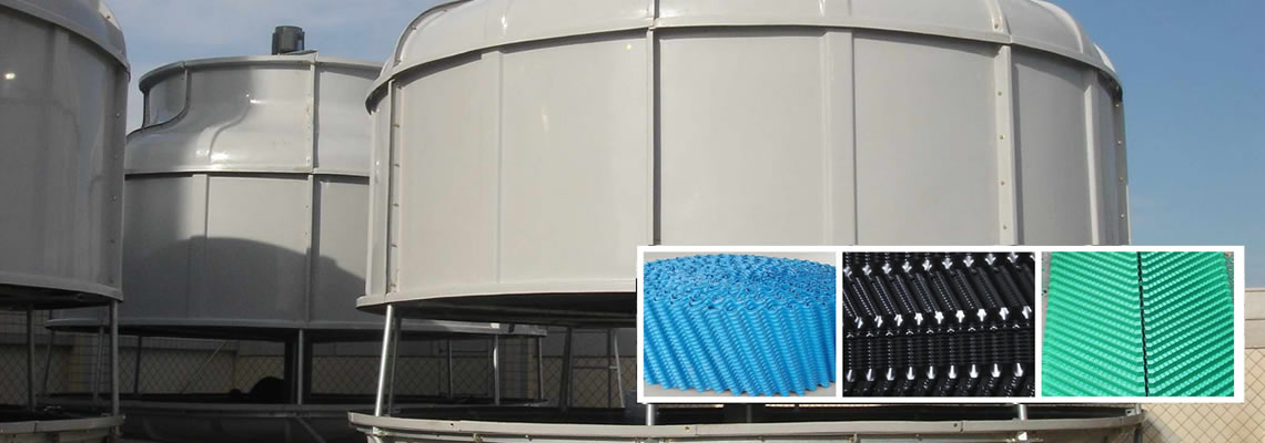 There is one piece and one mass of blue cooling tower fills, the piece of fill has s wave profile on the surface.