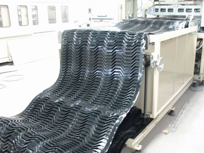 One kind of special cooling tower fill is manufactured by the machine.